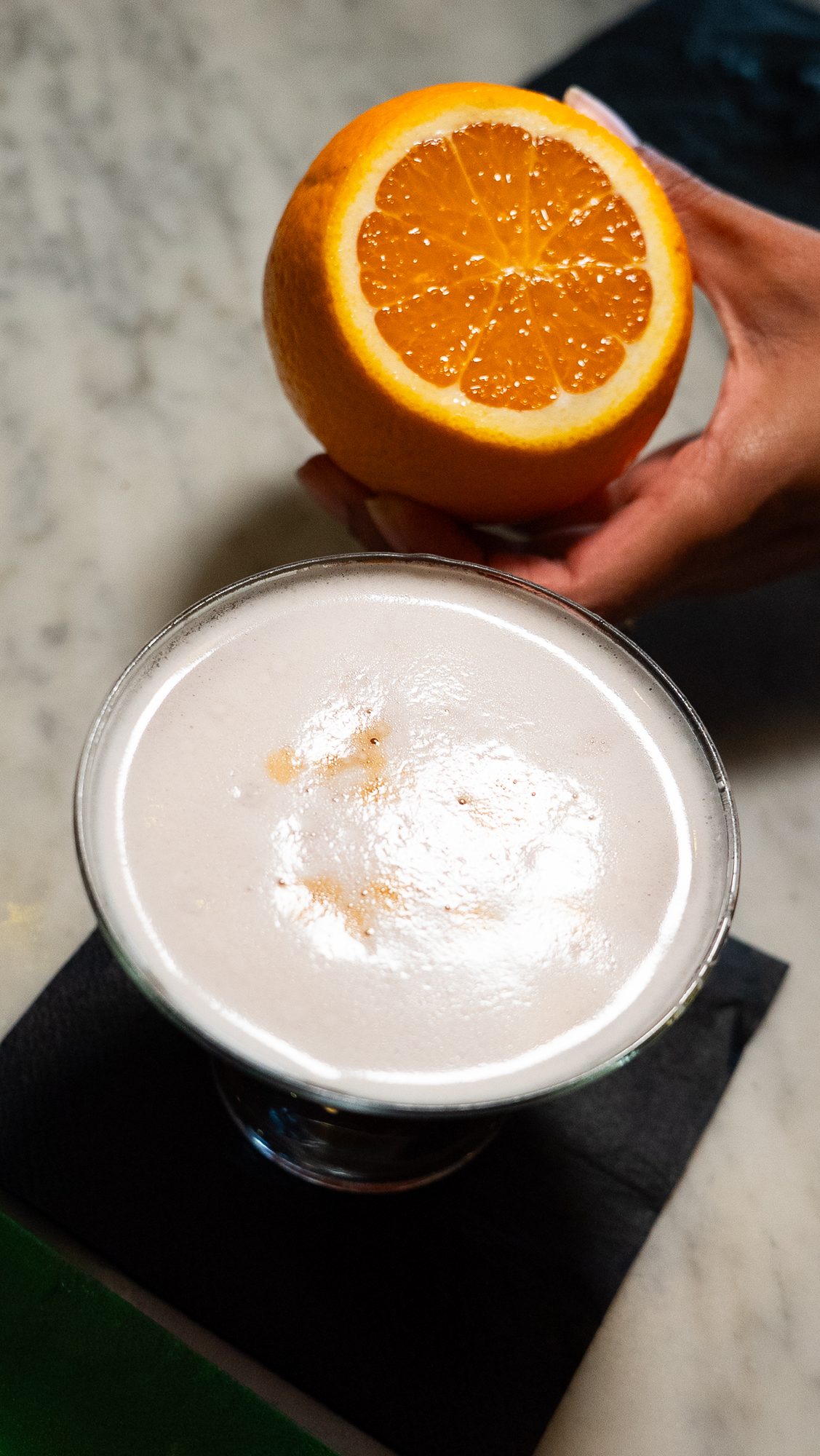 Cocktail with fresh orange at the Porteño bar