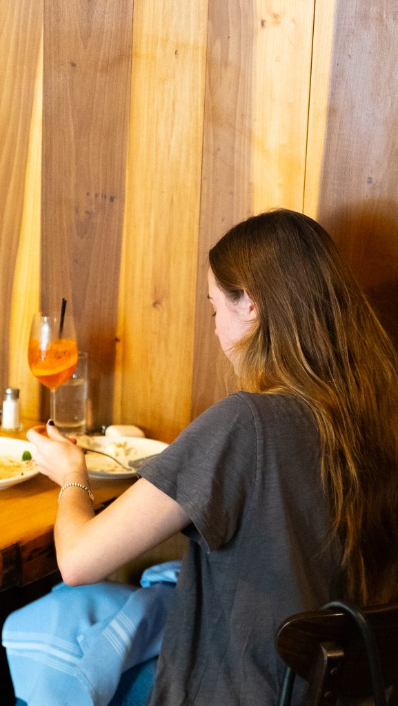 Guest enjoying a casual dining experience at an affordable steak house in Manhattan