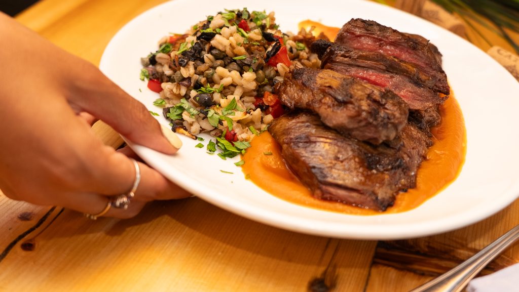Argentinian steak grilled over charcoal at Porteño NYC