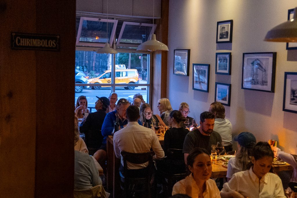 Guests enjoying Argentinian dinner at Porteño Restaurant Chelsea NYC