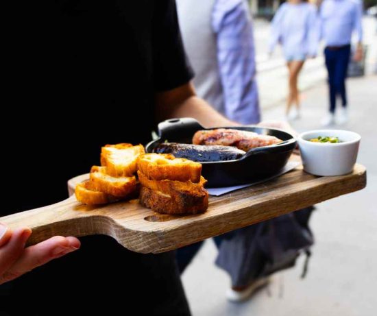 delicious chorizo and bread in a skillet