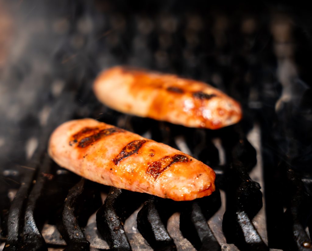 sausages grilling at Porteno 