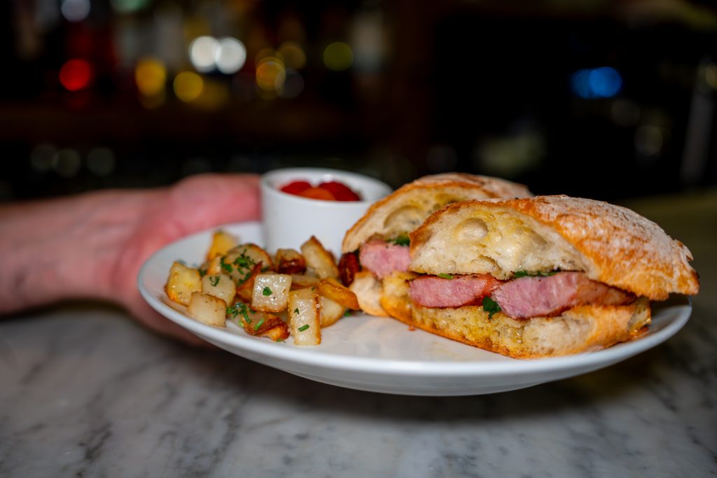 choripan with diced potatoes and pickled veggies